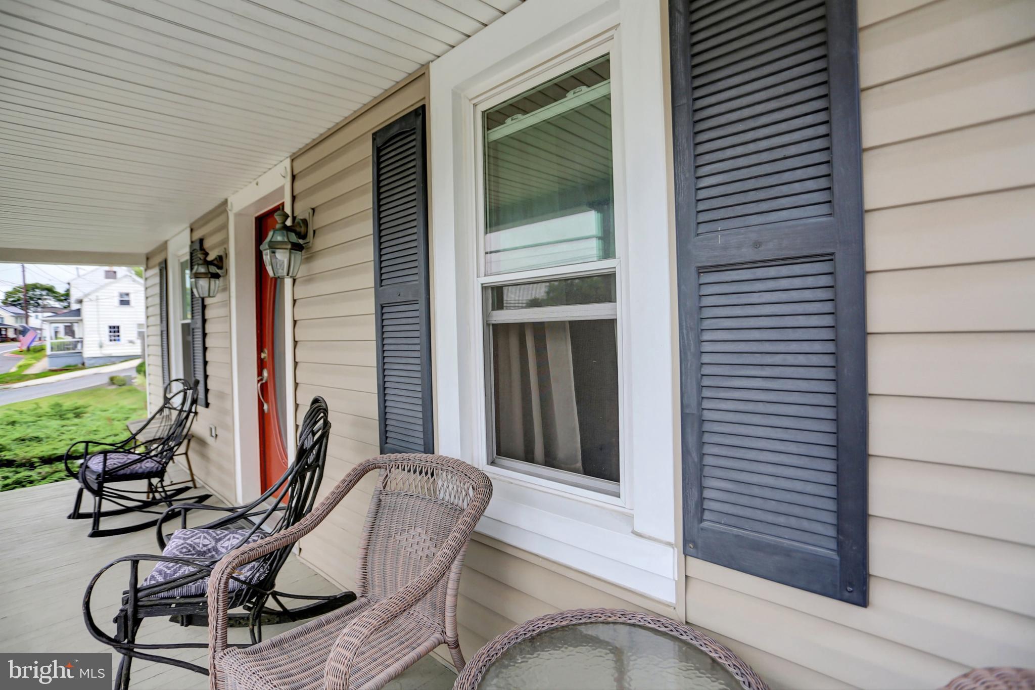 227 South Main Street Boonsboro, MD 21713 - Photo 6 of 53 a view of a balcony with furniture and a potted plant