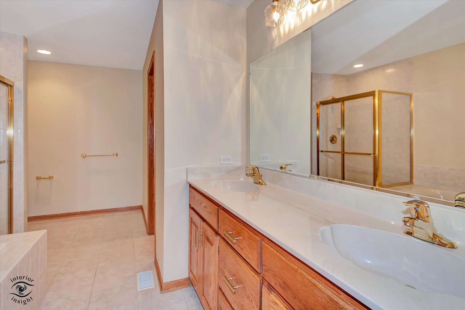 19612 Waterford Lane Mokena, IL 60448 - Photo 13 of 28 a bathroom with a sink and a mirror