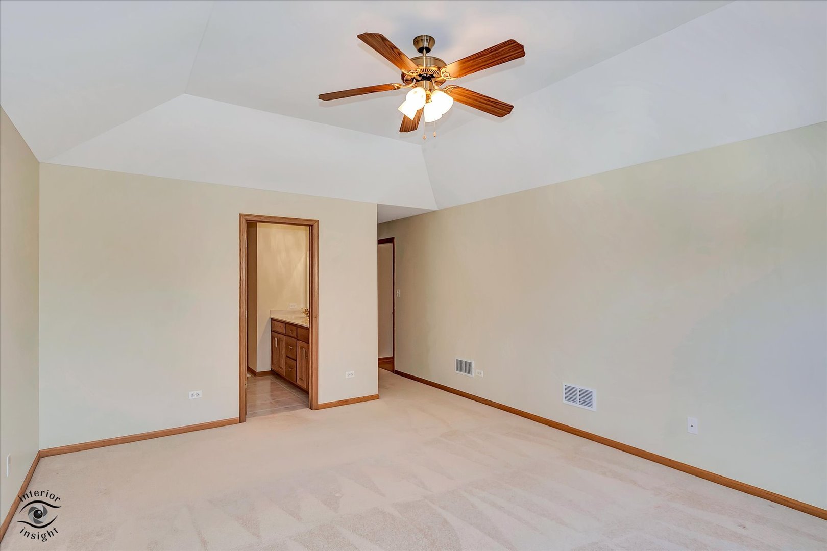 19612 Waterford Lane Mokena, IL 60448 - Photo 17 of 28 an empty room with closet and a chandelier fan
