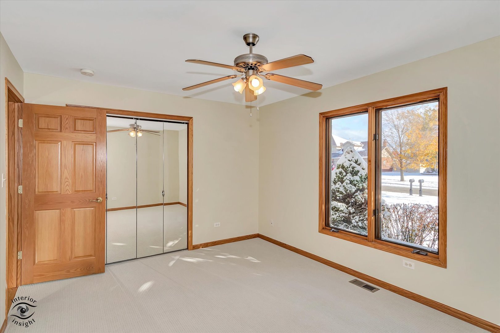 19612 Waterford Lane Mokena, IL 60448 - Photo 19 of 28 a view of empty room with wooden floor and fan