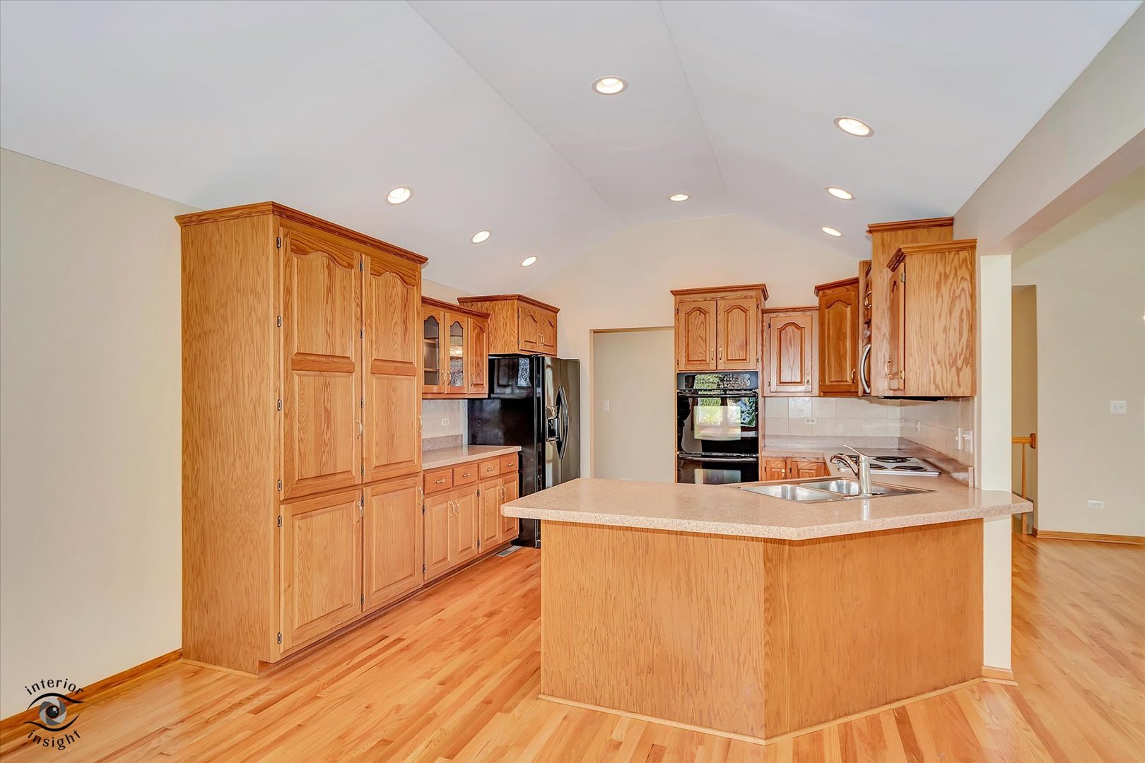 19612 Waterford Lane Mokena, IL 60448 - Photo 9 of 28 a kitchen with stainless steel appliances granite countertop a refrigerator and a sink