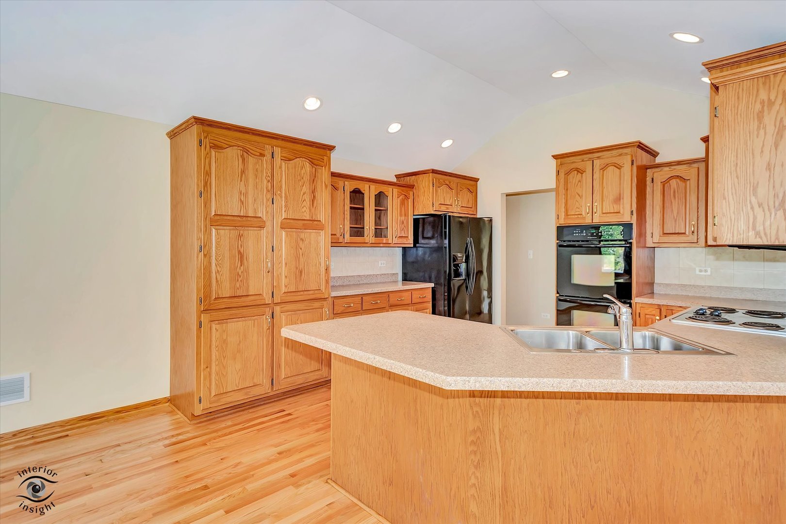 19612 Waterford Lane Mokena, IL 60448 - Photo 10 of 28 a kitchen with stainless steel appliances granite countertop a refrigerator a sink and a stove