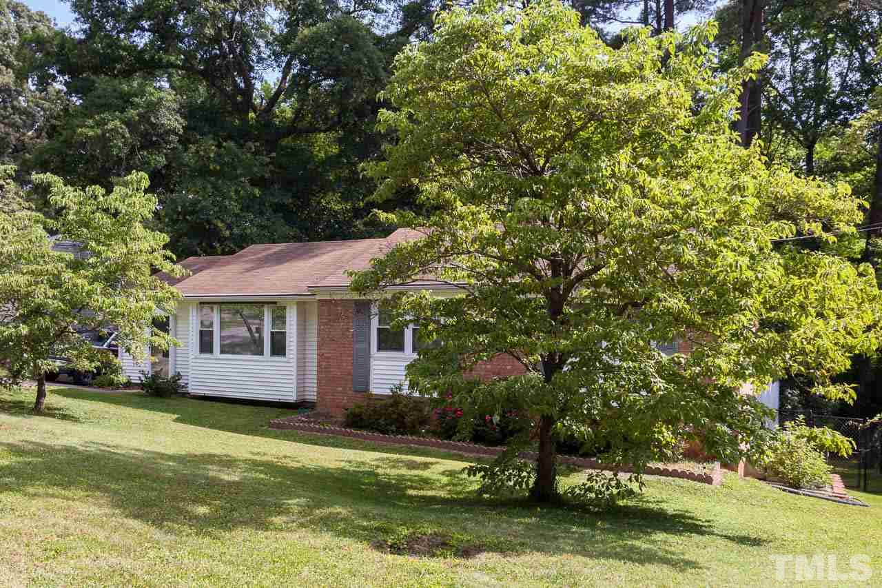 2252 Rumson Road Raleigh, NC 27610 - Photo 2 of 20 a view of a house with a yard