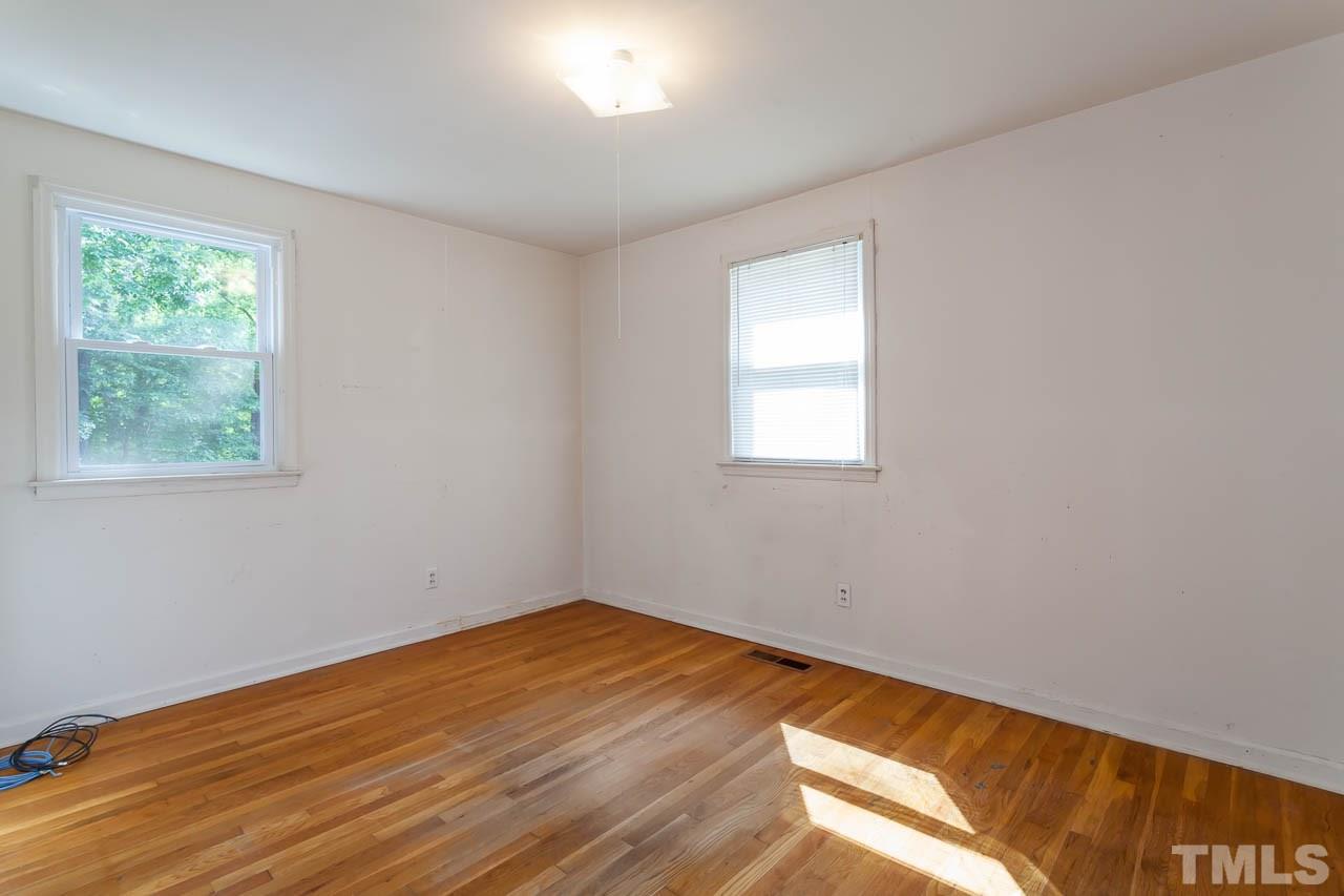 2252 Rumson Road Raleigh, NC 27610 - Photo 12 of 20 a view of a room that has a window in it