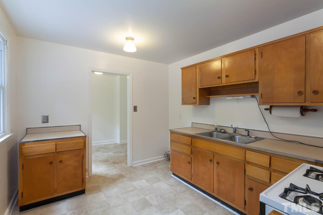 2252 Rumson Road Raleigh, NC 27610 - Photo 5 of 20 a room with storage and utility
