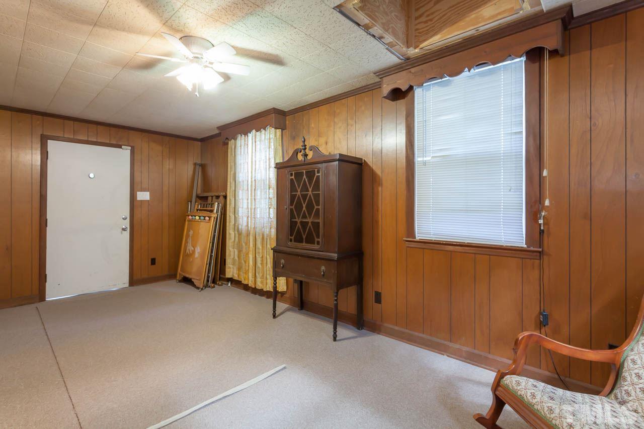 2252 Rumson Road Raleigh, NC 27610 - Photo 9 of 20 a view of an empty room with a window