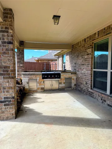 a view of a backyard of a house
