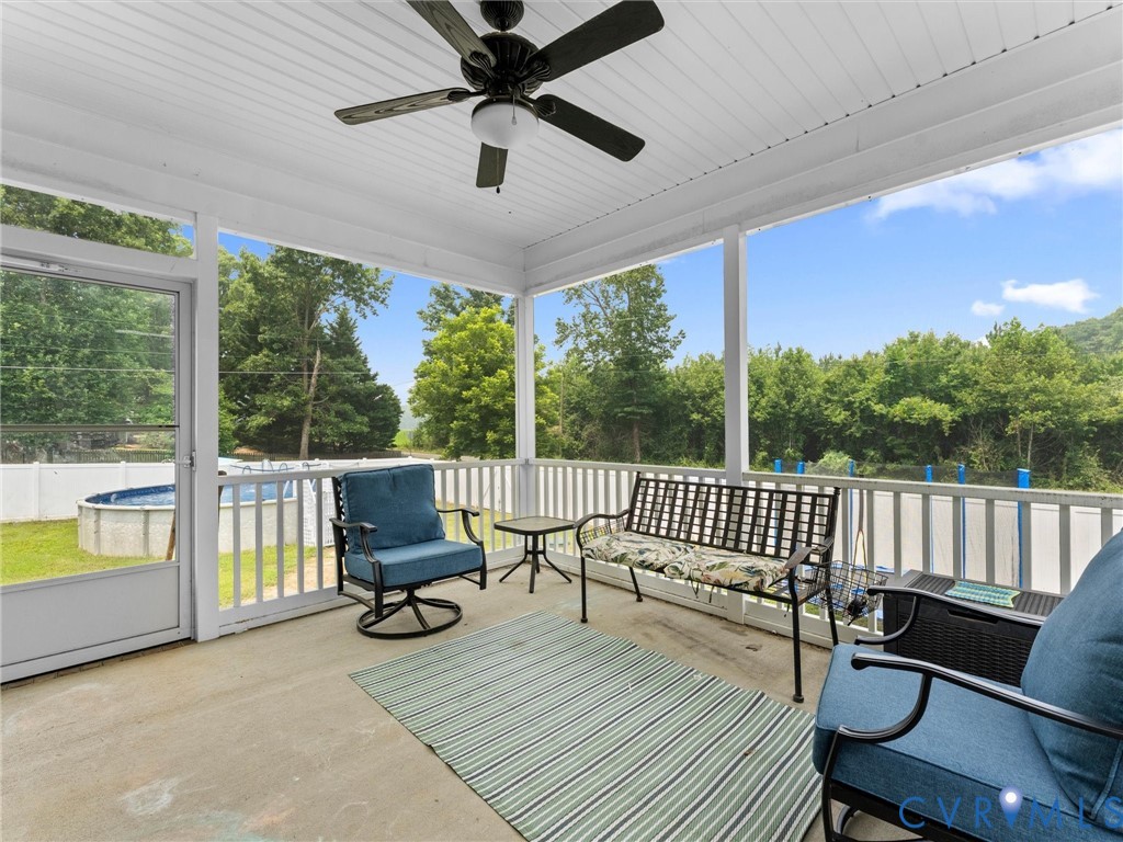 11390 Rocky Ridge Road Glen Allen, VA 23059 - Photo 56 of 82 Screened porch featuring a ceiling fan, concrete f