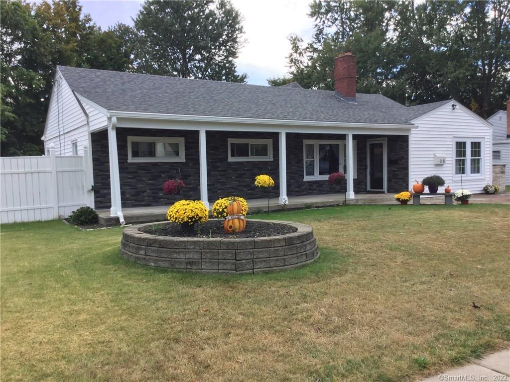 38 Conway Road Manchester, CT 06042 - Photo 1 of 1 a front view of a house with a garden and porch