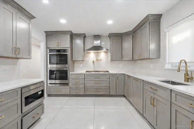 a kitchen with cabinets and a stove top oven
