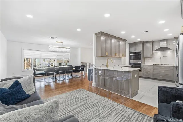 a kitchen with stainless steel appliances granite countertop a refrigerator sink and cabinets