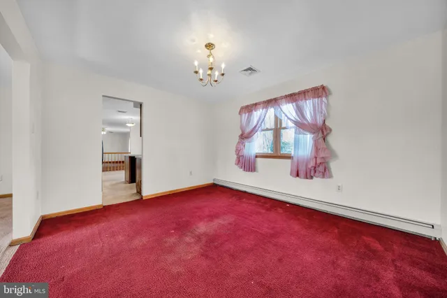 a kitchen that has a sink and a stove