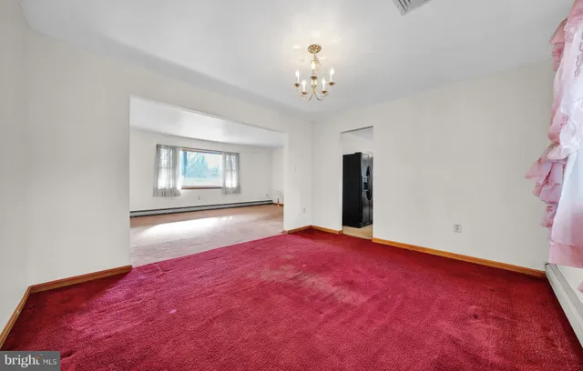 a kitchen with a sink and refrigerator