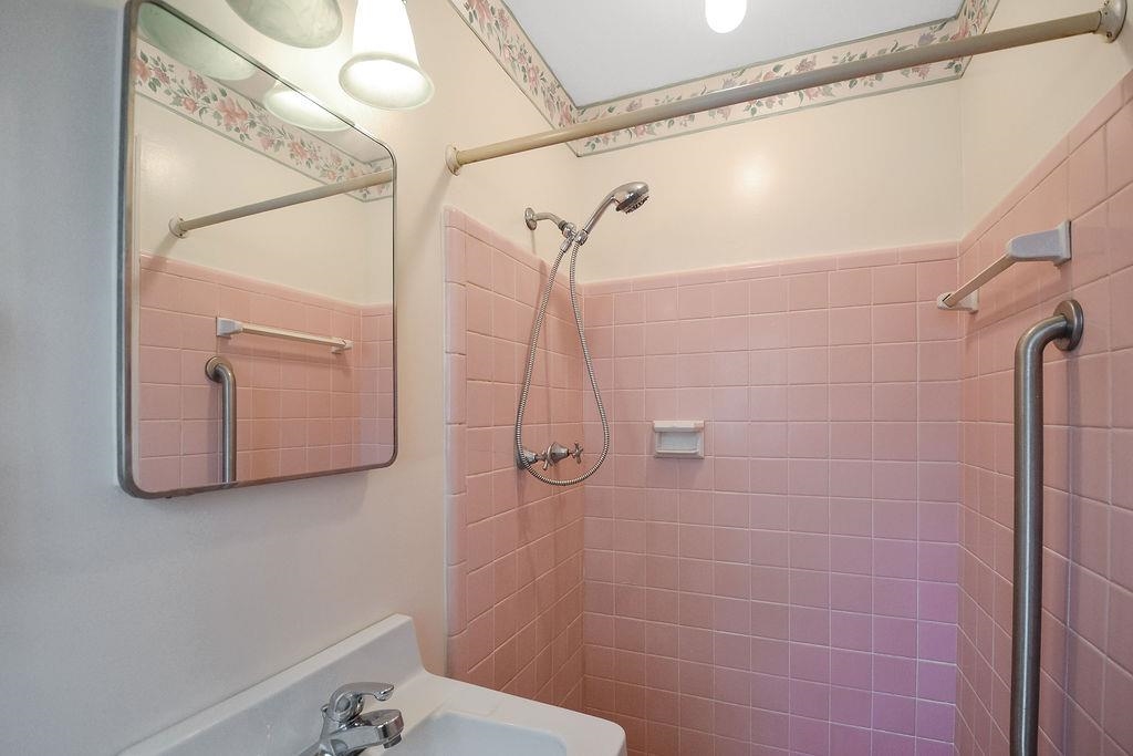 1514 Ivy Road Memphis, TN 38117 - Photo 22 of 30 a bathroom with a shower and a sink