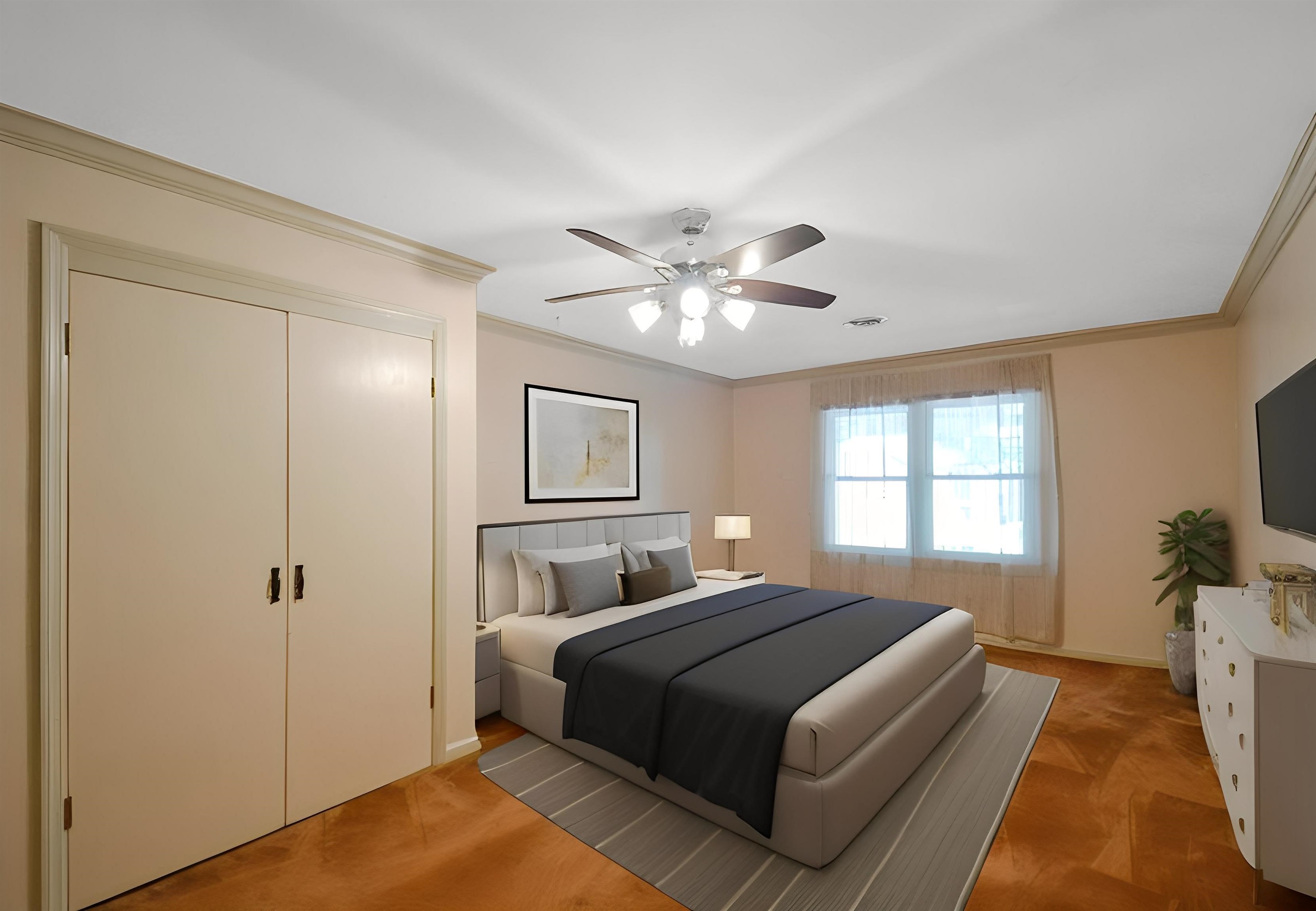 1514 Ivy Road Memphis, TN 38117 - Photo 25 of 30 a bedroom with a large bed and a chandelier