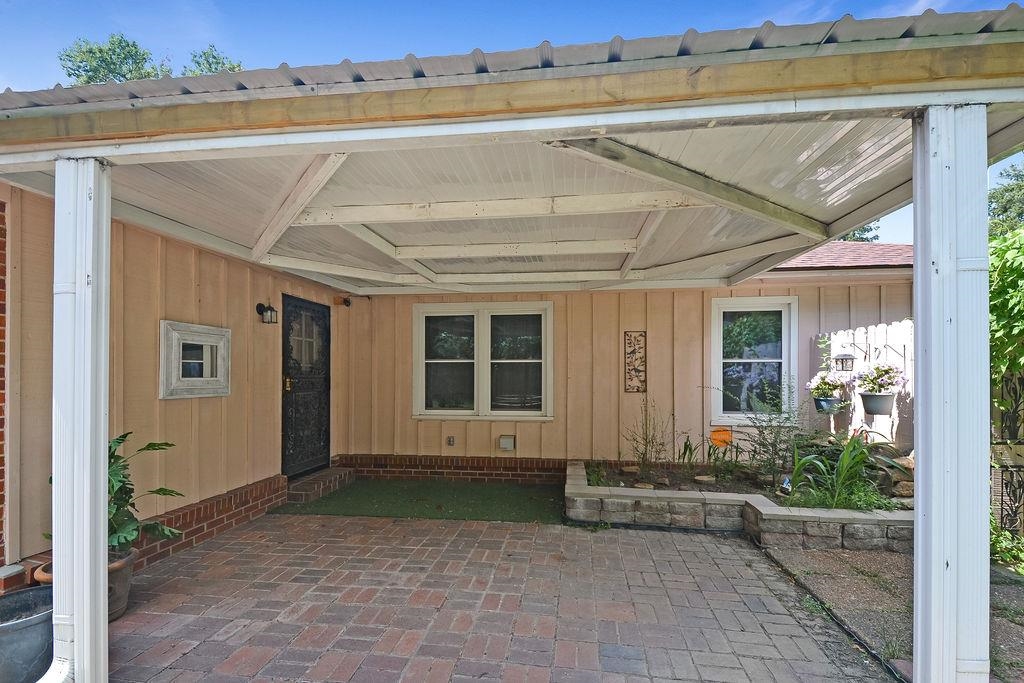 1514 Ivy Road Memphis, TN 38117 - Photo 3 of 30 a front view of a house with a yard