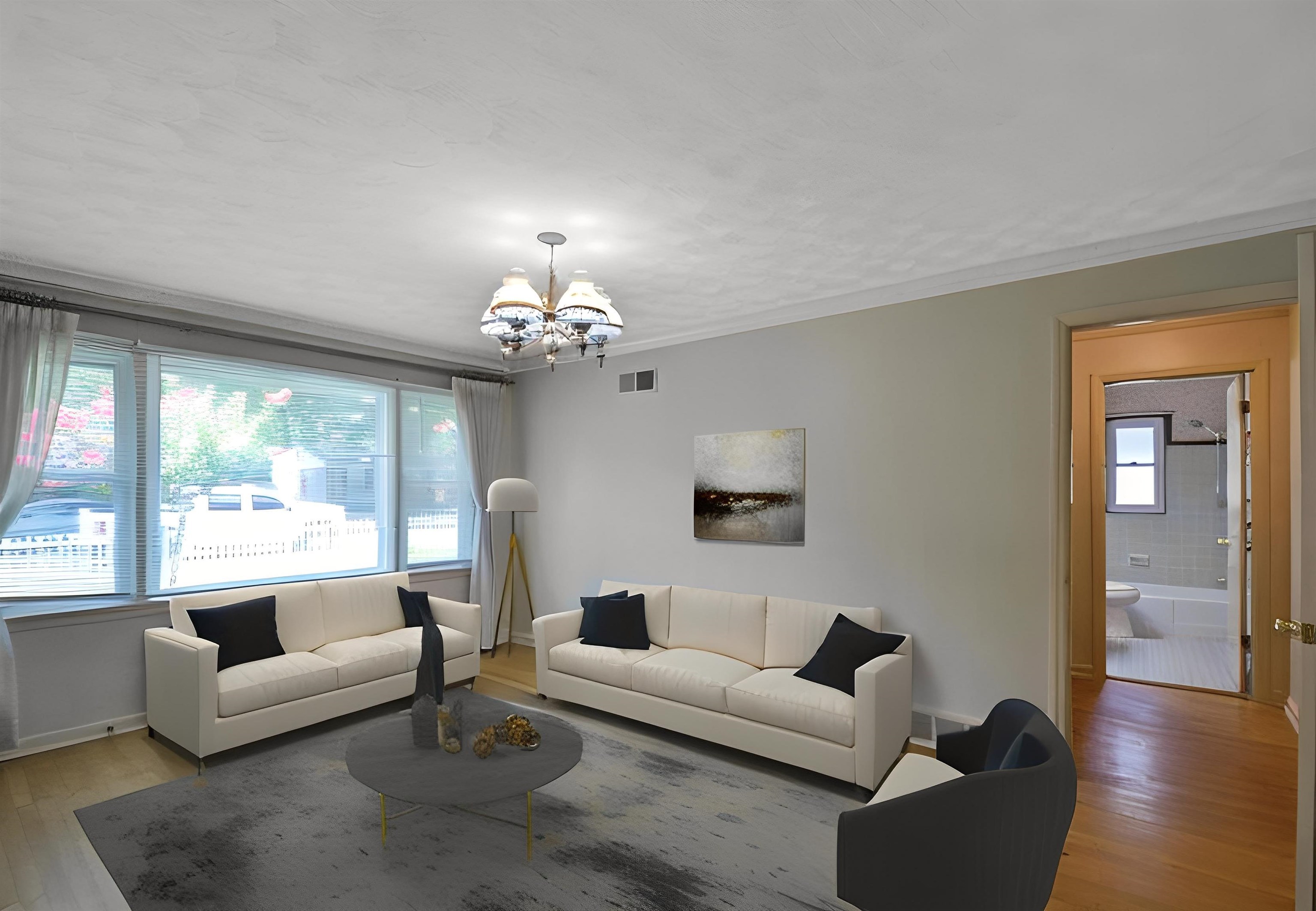 1514 Ivy Road Memphis, TN 38117 - Photo 7 of 30 a living room with furniture and a chandelier