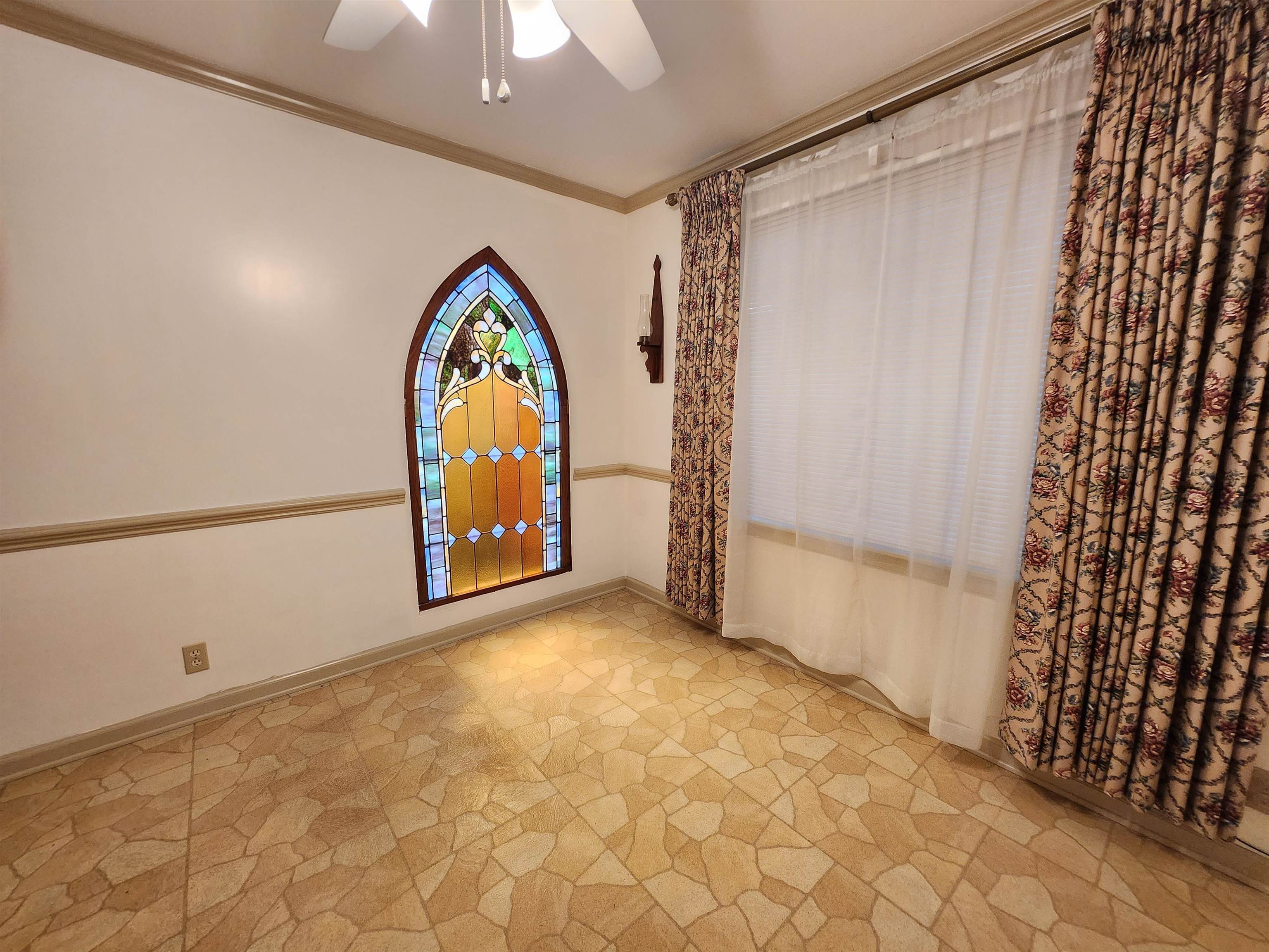 1514 Ivy Road Memphis, TN 38117 - Photo 10 of 30 a view of an empty room with a window