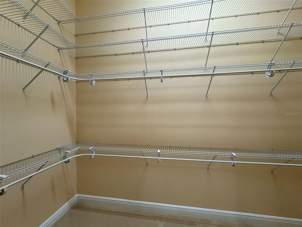 1024 West Beagle Run Loop Hernando, FL 34442 - Photo 31 of 44 a view of a room with racks on the wall