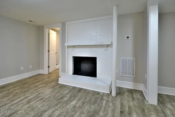 a kitchen with a stove and a microwave