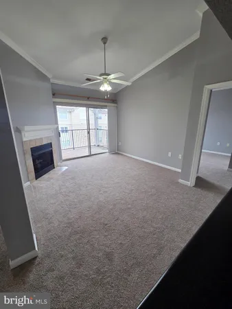 a bathroom with a sink a toilet a mirror and shower