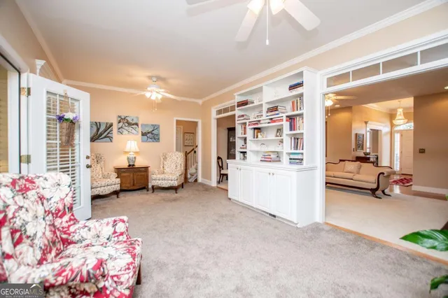 a view of livingroom with furniture and toys
