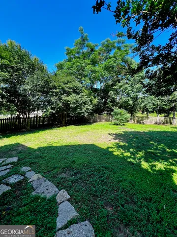a view of a golf course with a garden
