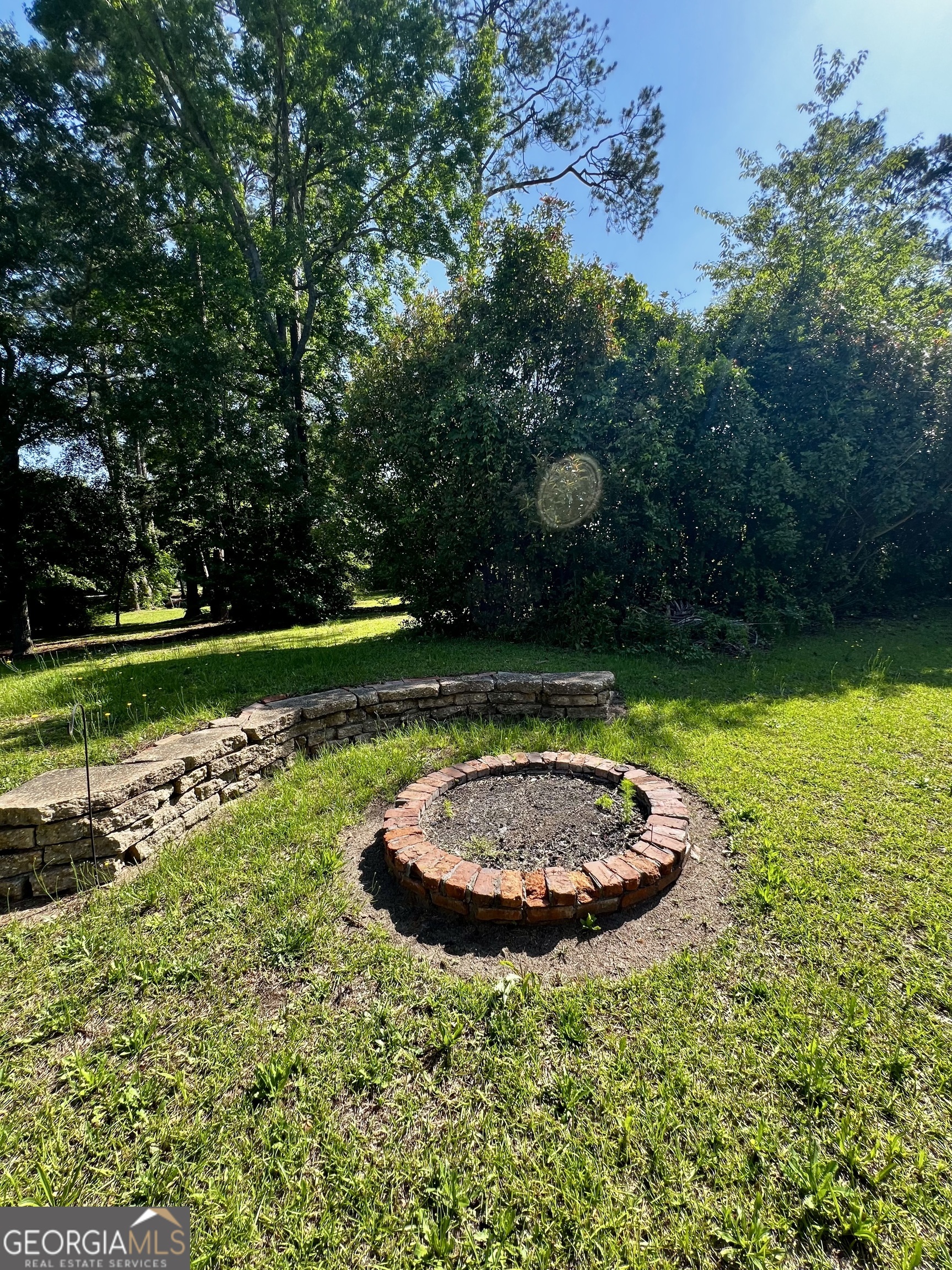 1311 3rd Street Dudley, GA 31022 - Photo 14 of 43 a view of a swimming pool and a yard