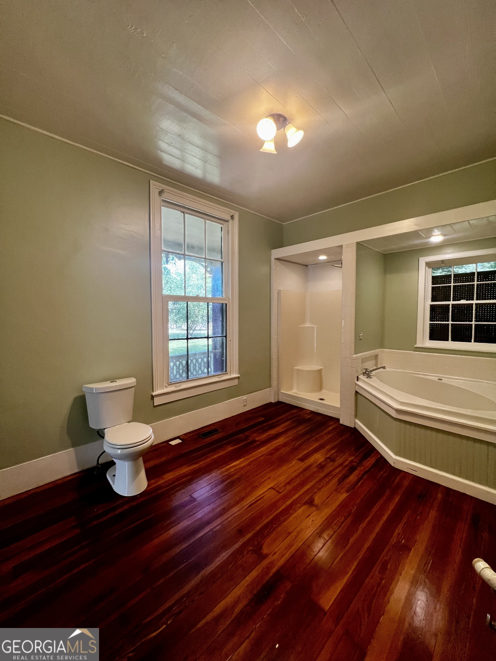 1311 3rd Street Dudley, GA 31022 - Photo 34 of 43 a bedroom with a bed and window