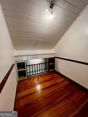 a view of entryway with wooden floor
