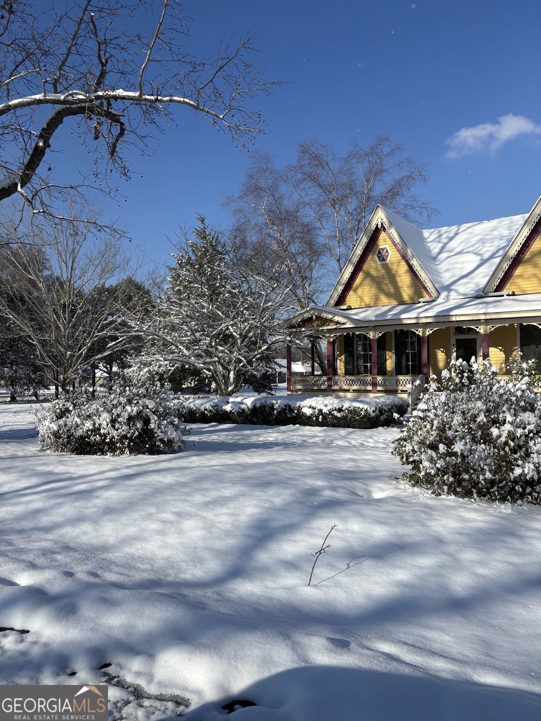 1311 3rd Street Dudley, GA 31022 - Photo 4 of 43 a front view of a house with garden