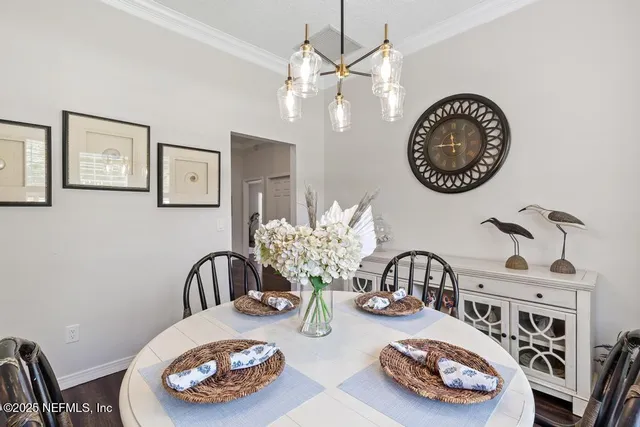 a bathroom with a granite countertop sink a toilet and mirror