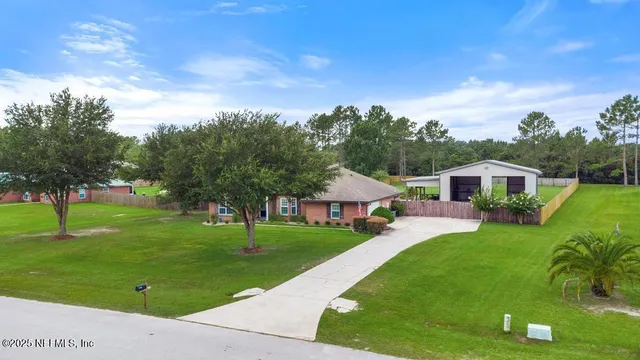 a view of a house with swimming pool and porch