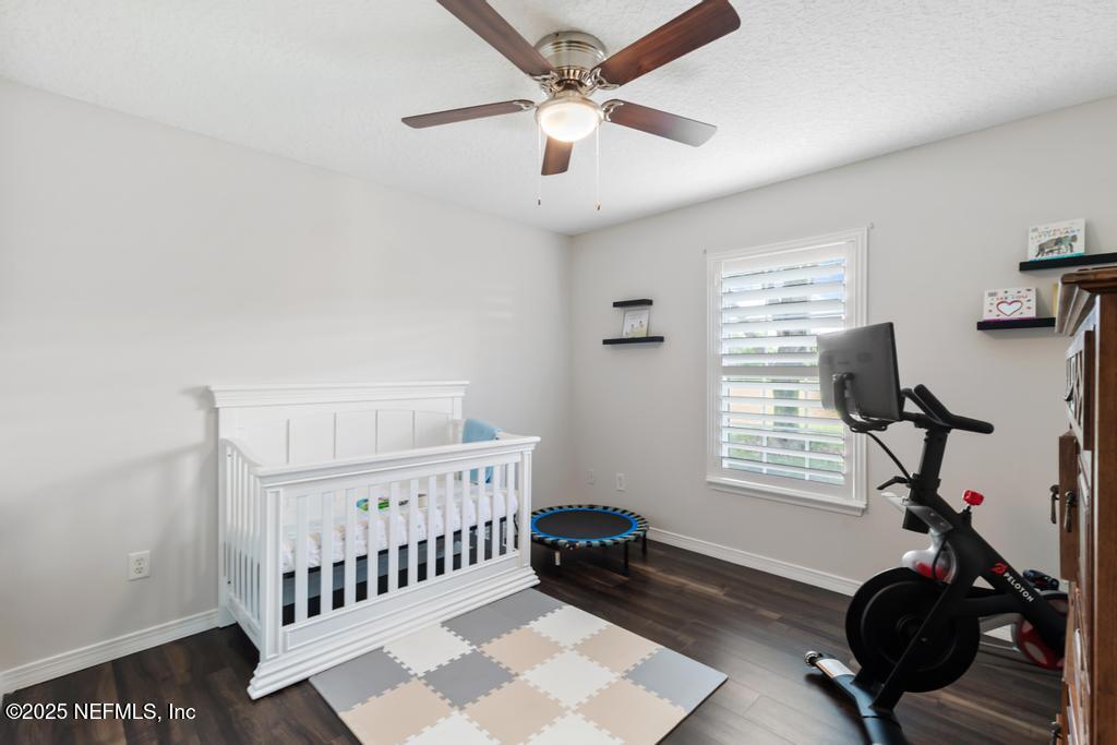 44677 Green Meadows Lane Callahan, FL 32011 - Photo 23 of 91 a bedroom with furniture and a window