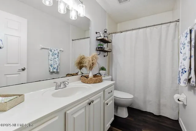 a dinning room and kitchen with a table chairs