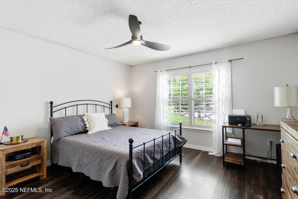 44677 Green Meadows Lane Callahan, FL 32011 - Photo 28 of 91 a bedroom with a bed and a window