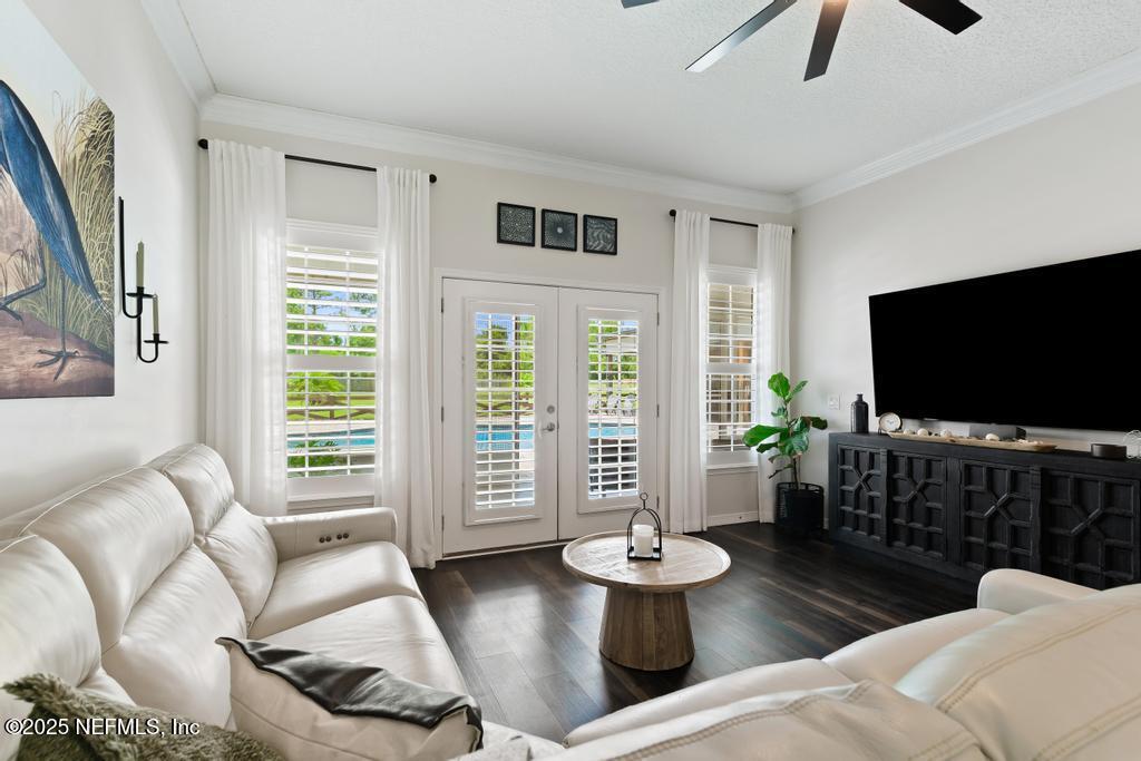 44677 Green Meadows Lane Callahan, FL 32011 - Photo 30 of 91 a living room with furniture and a flat screen tv