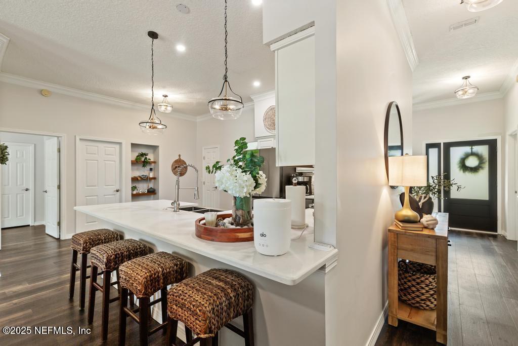 44677 Green Meadows Lane Callahan, FL 32011 - Photo 33 of 91 a dinning room and kitchen with a table chairs