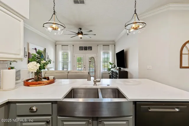 a view of a patio with a table and chairs
