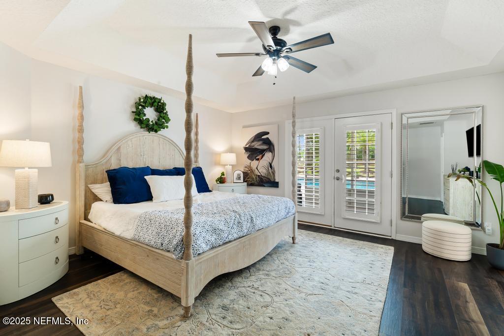 44677 Green Meadows Lane Callahan, FL 32011 - Photo 42 of 91 a bedroom with a large bed and a window