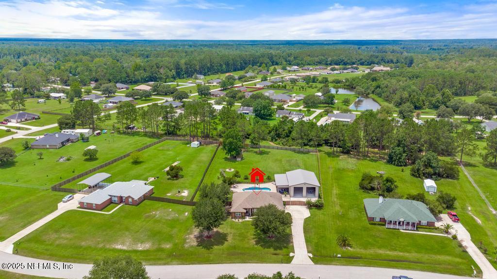 44677 Green Meadows Lane Callahan, FL 32011 - Photo 89 of 91 an aerial view of tennis court