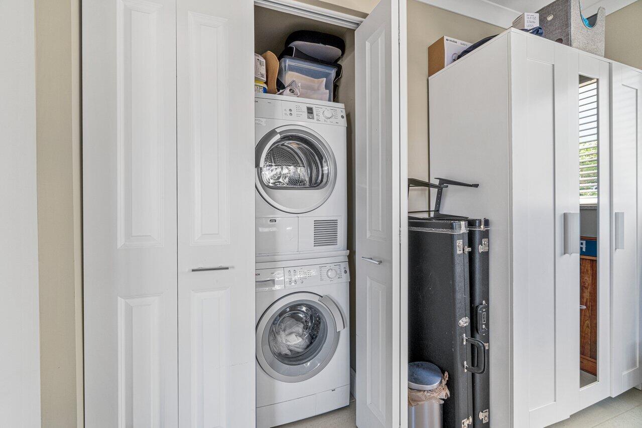 2311 Northeast 36th Street, Unit 1A Lighthouse Point, FL 33064 - Photo 19 of 29 a utility room with dryer and washer