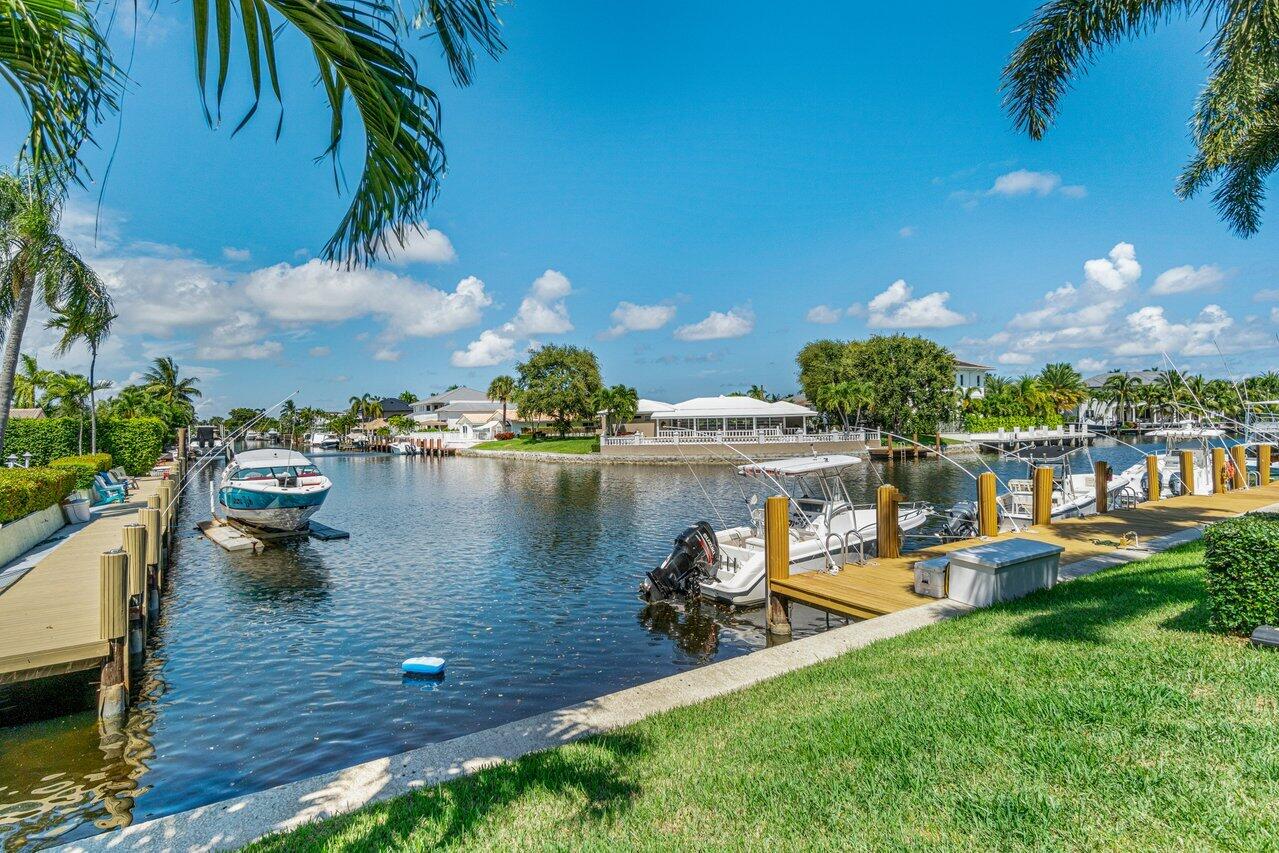 2311 Northeast 36th Street, Unit 1A Lighthouse Point, FL 33064 - Photo 24 of 29 a view of a lake with houses