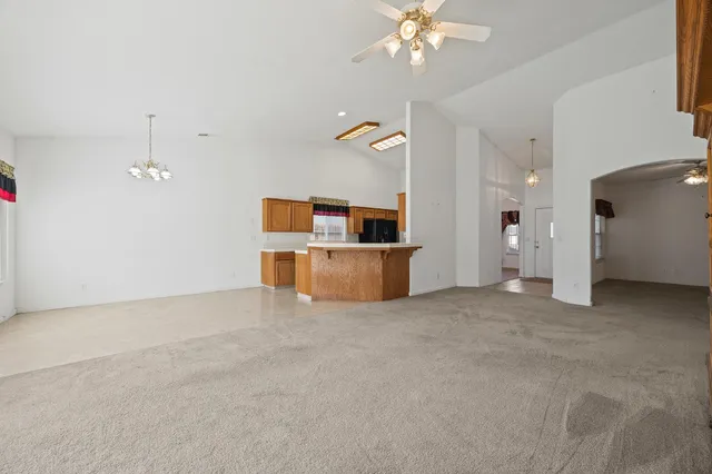 a view of a kitchen with a sink and cabinet
