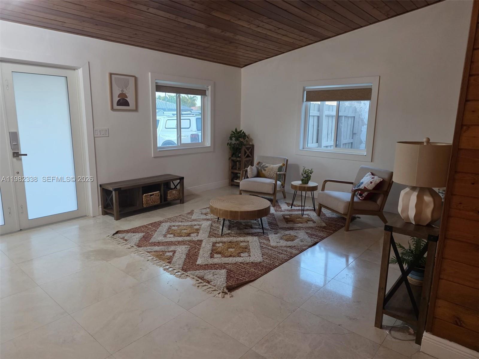 14530 Southwest 110th Street Miami, FL 33186 - Photo 6 of 45 a dining room with furniture and a window
