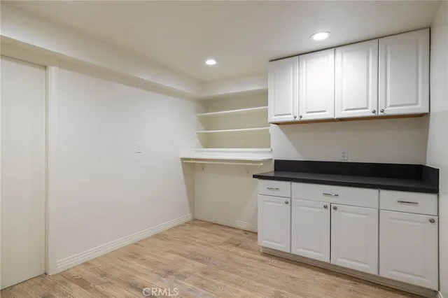 a bathroom with a toilet sink and shower