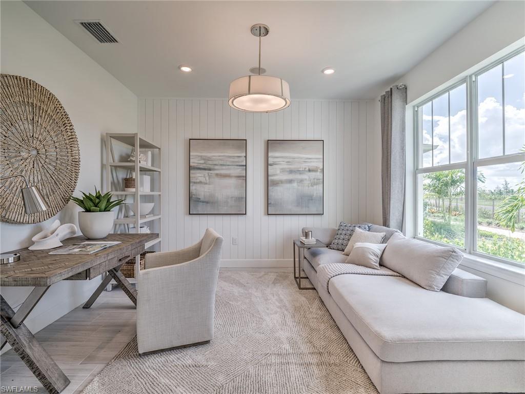 15635 Northridge Road Punta Gorda, FL 33982 - Photo 6 of 49 a living room with furniture and a large window