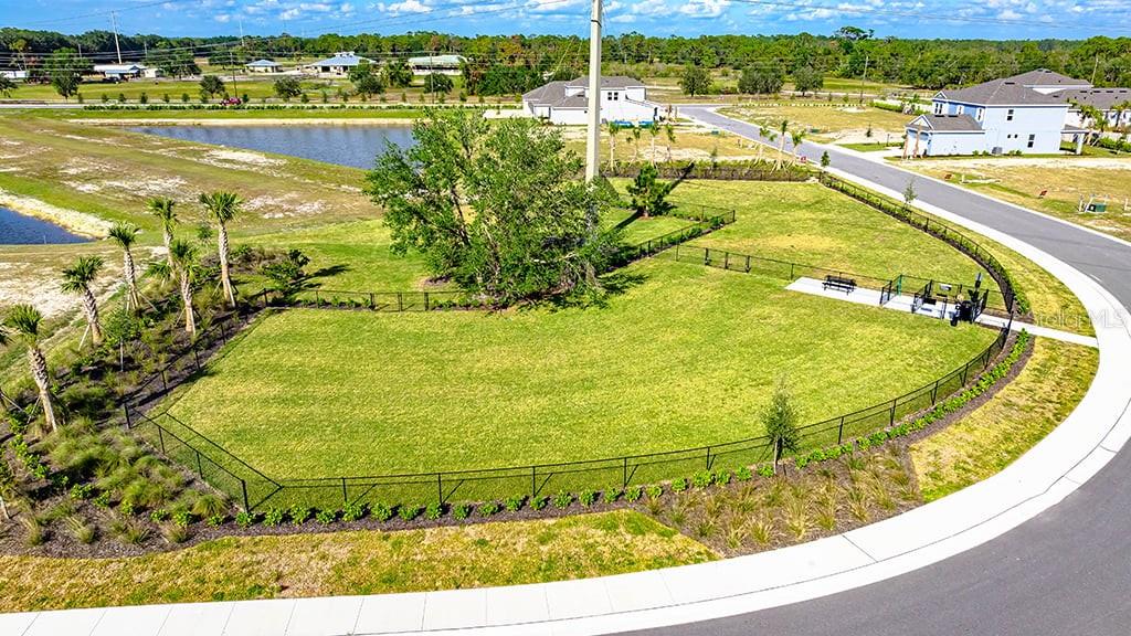 6917 Prairie Oak Way Nokomis, FL 34275 - Photo 27 of 28 a view of a swimming pool with a lawn chairs