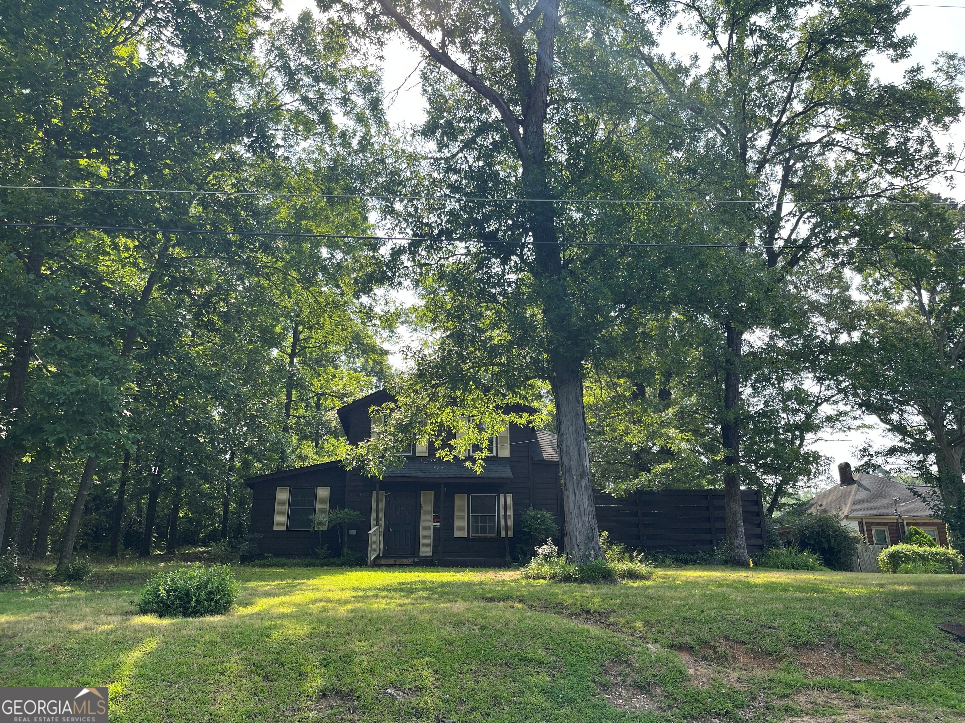100 Timothy Avenue Rome, GA 30165 - Photo 1 of 1 a view of a house with a yard deck and a tree