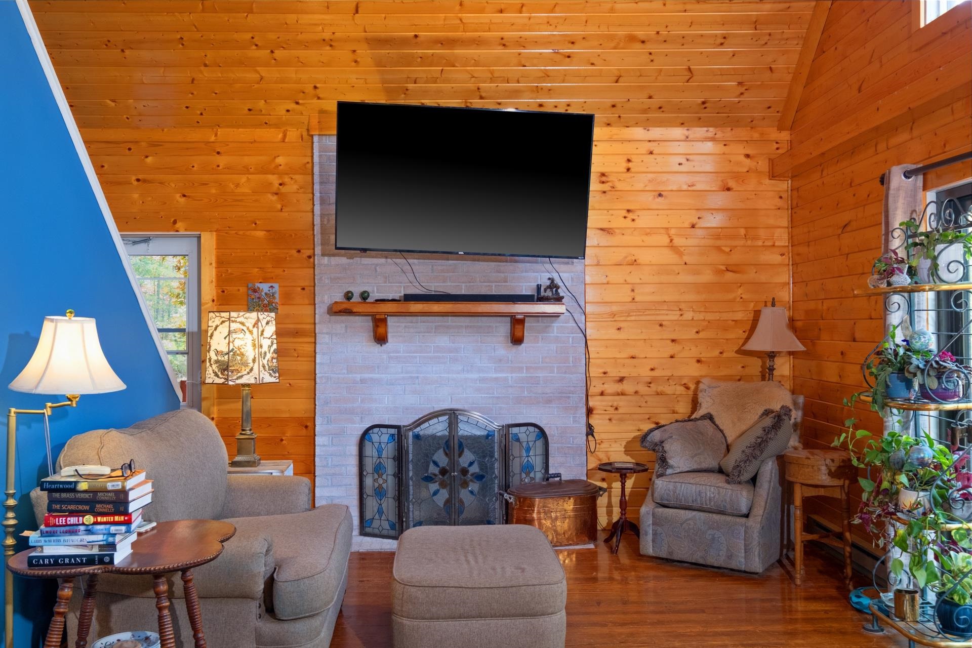 65 Cubbley Road Hot Springs, VA 24445 - Photo 17 of 56 a outdoor living space with furniture and a fireplace